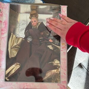 Elegant Brown and Gold Barbie doll